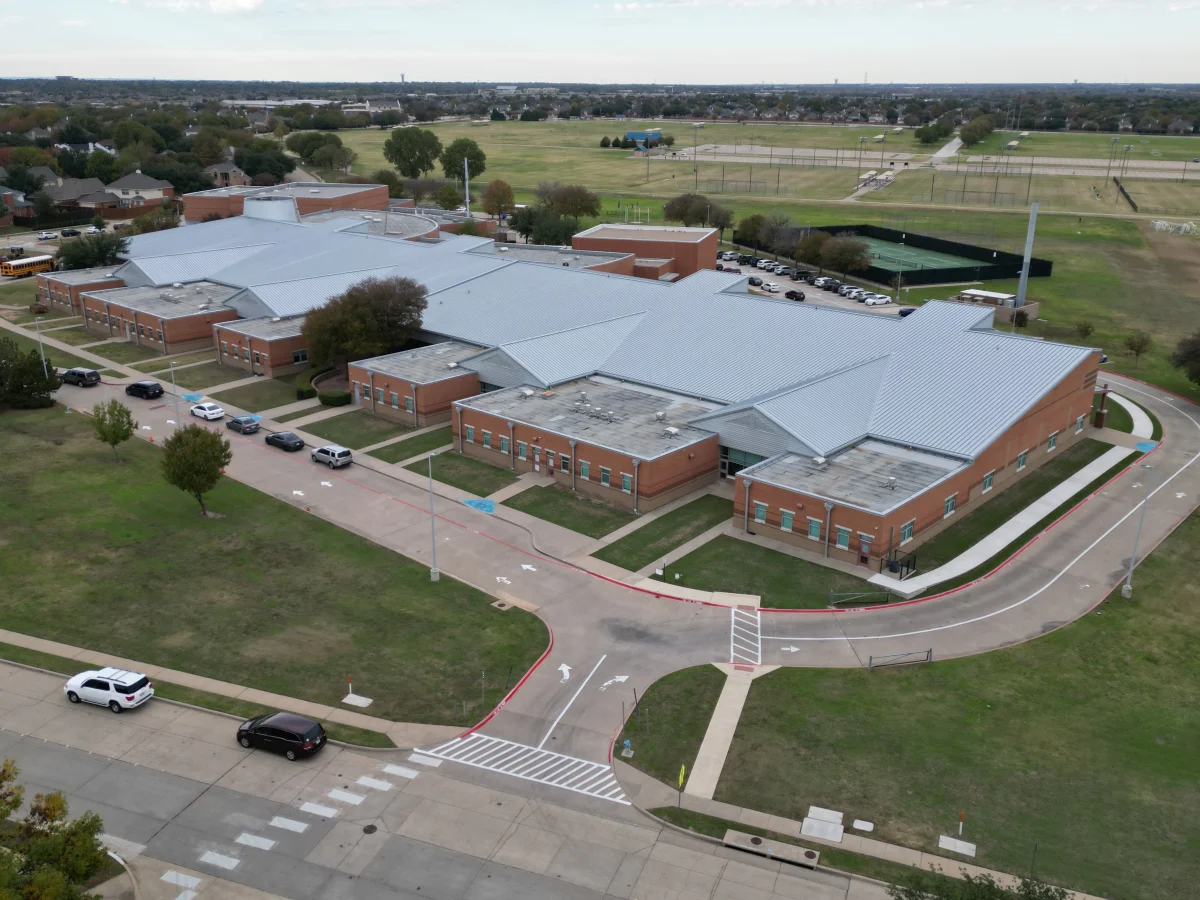 Aerial view of a Plano school campus and neighboring athletic fields